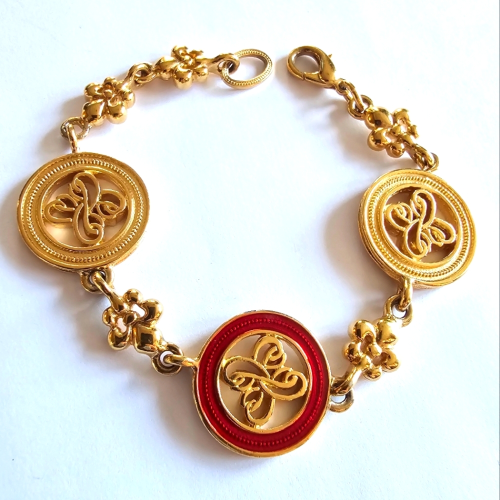 Red bracelet gold tone classic elegant discs fancy fleur de lis lys